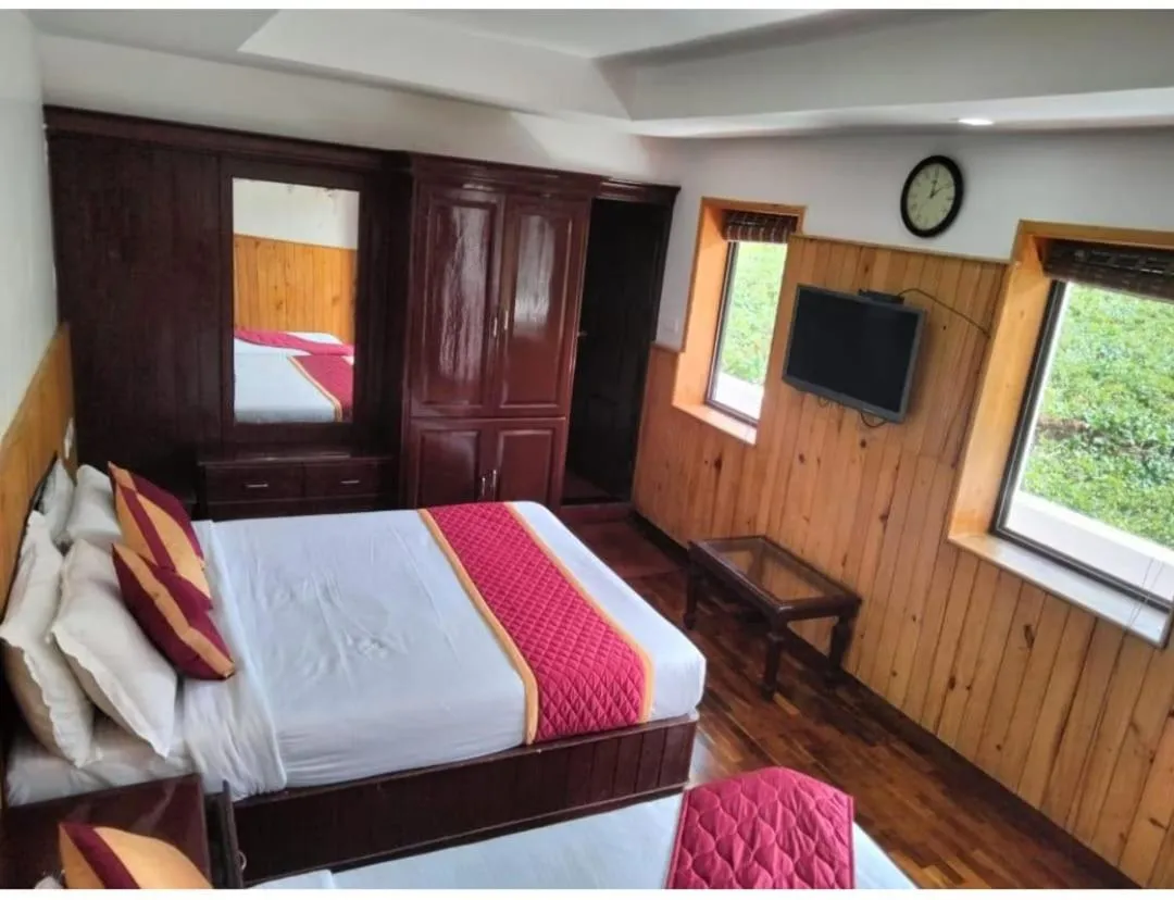 Bed in Tree Elanza, Unit of Santhi Ayurvedic Resort