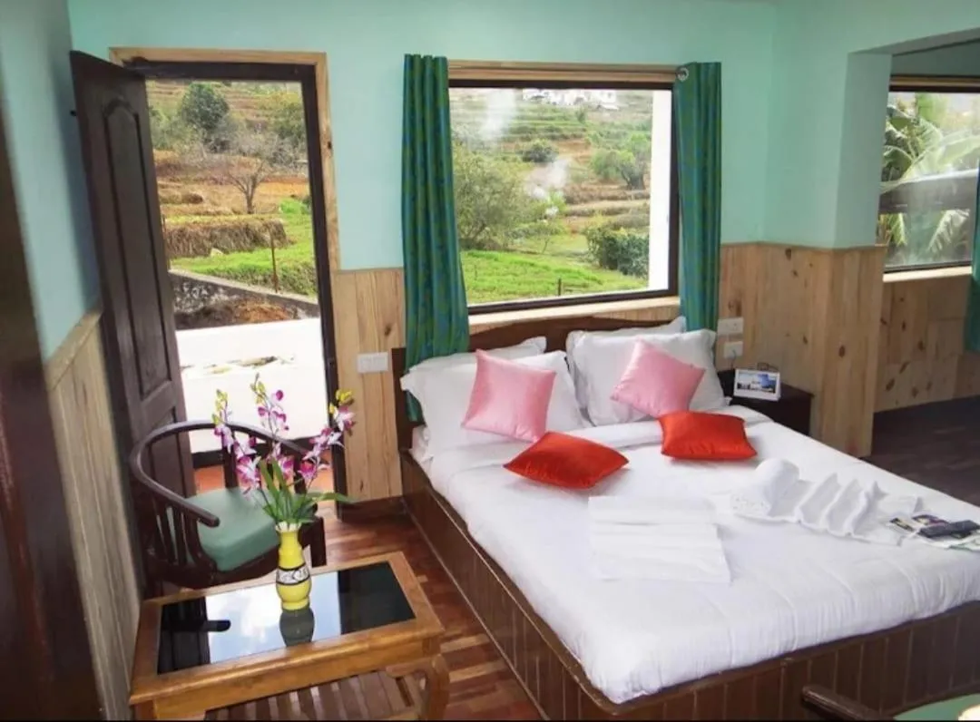 Bed in Tree Elanza, Unit of Santhi Ayurvedic Resort