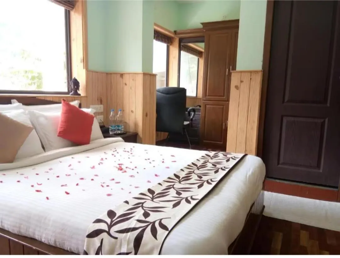 Bed in Tree Elanza, Unit of Santhi Ayurvedic Resort