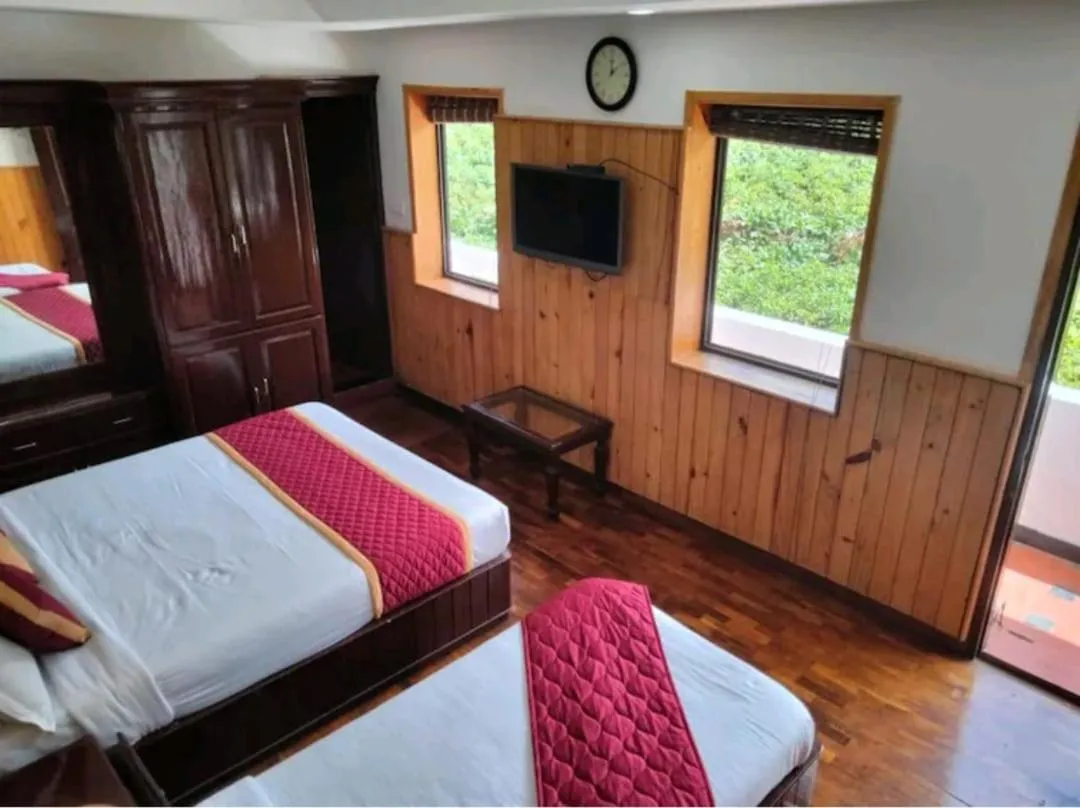 Bed in Tree Elanza, Unit of Santhi Ayurvedic Resort