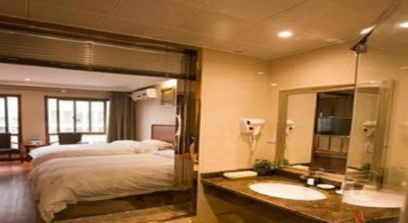 Bed in GreenTree Inn ChiZhou QinGYAng Miaoqian Road Rongxing Building Business Hotel