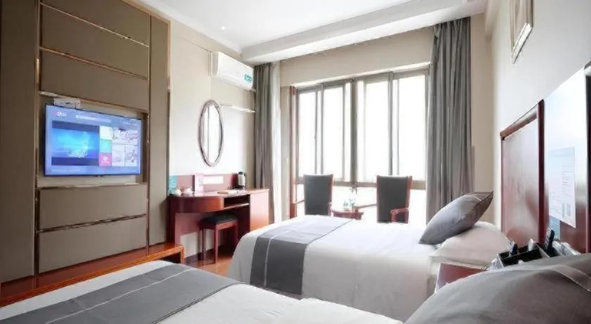 Bed in GreenTree Inn ChiZhou QinGYAng Miaoqian Road Rongxing Building Business Hotel