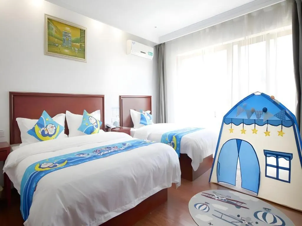 Bed in GreenTree Inn ChiZhou QinGYAng Miaoqian Road Rongxing Building Business Hotel