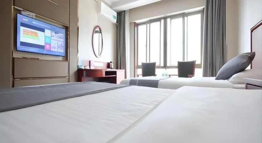 Bed in GreenTree Inn ChiZhou QinGYAng Miaoqian Road Rongxing Building Business Hotel