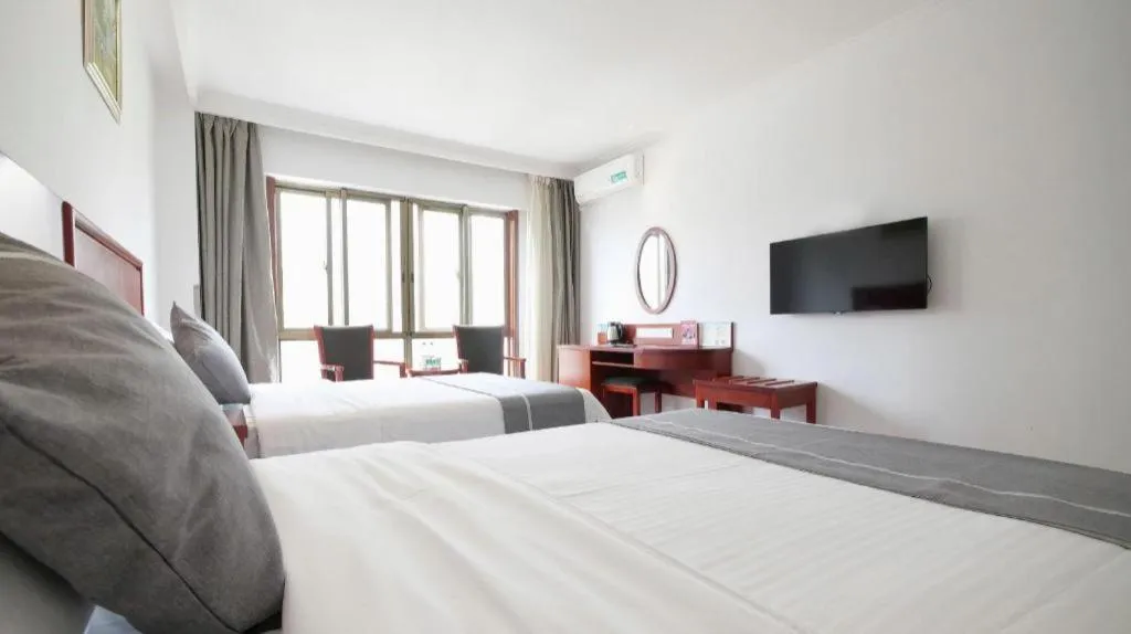 Bed in GreenTree Inn ChiZhou QinGYAng Miaoqian Road Rongxing Building Business Hotel