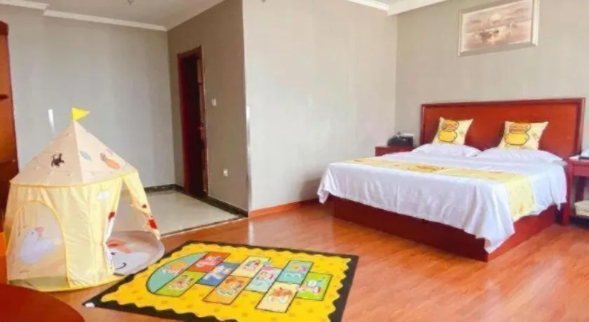 Bed in GreenTree Inn ChiZhou QinGYAng Miaoqian Road Rongxing Building Business Hotel