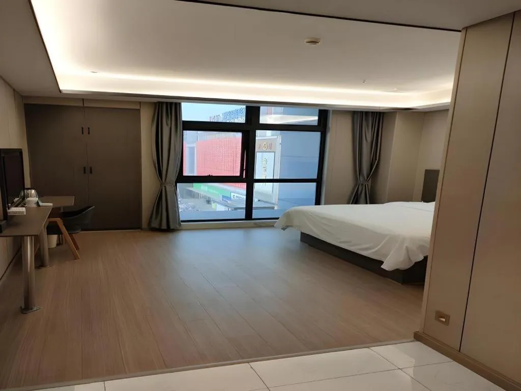 Bed in GreenTree Inn ChaoHu Tianchao Plaza Express Hotel