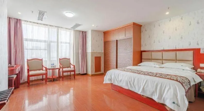 Bed in GreenTree Inn Chuzhou City Quanjiao County High-Speed Italy Trade City Business Hotel