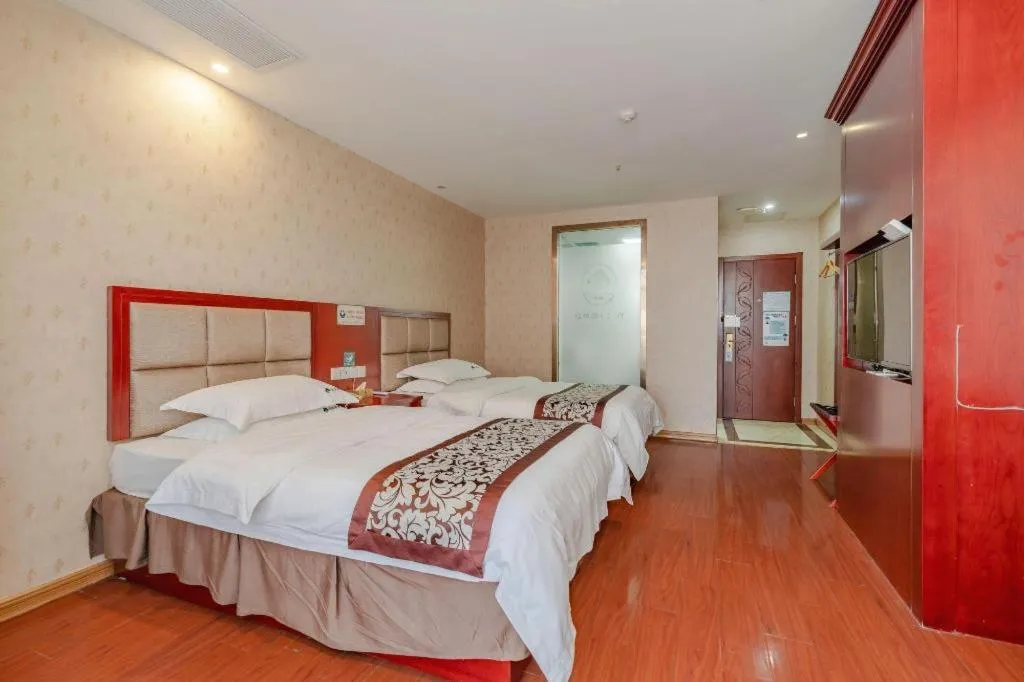 Bed in GreenTree Inn Chuzhou City Quanjiao County High-Speed Italy Trade City Business Hotel