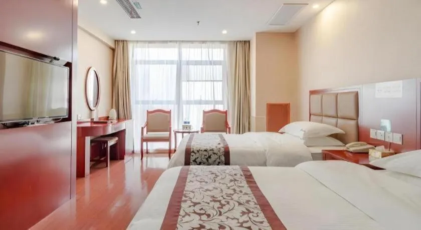 Bed in GreenTree Inn Chuzhou City Quanjiao County High-Speed Italy Trade City Business Hotel