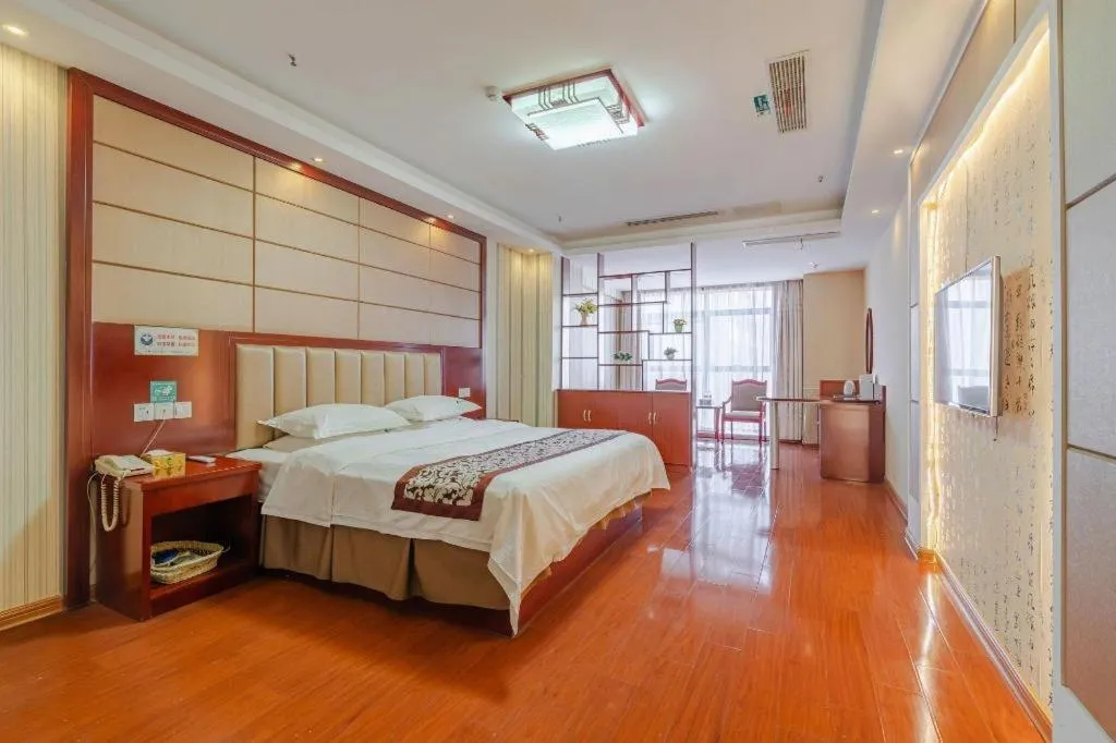 Bed in GreenTree Inn Chuzhou City Quanjiao County High-Speed Italy Trade City Business Hotel