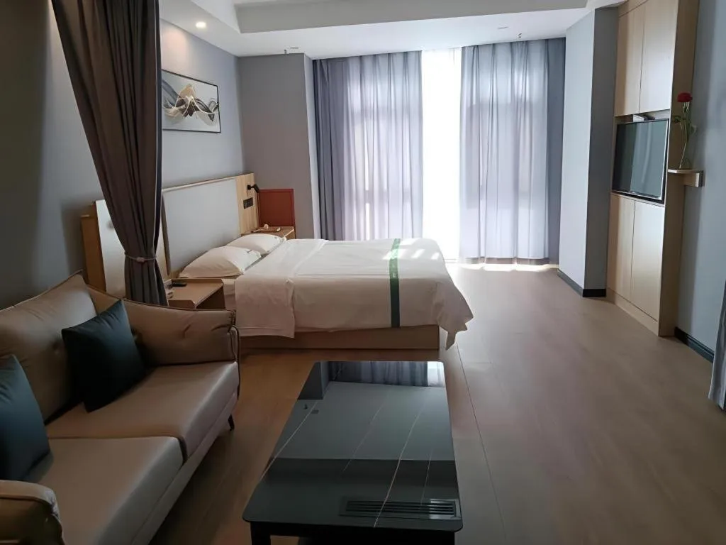 Bed in GreenTree Inn Chuzhou City Quanjiao County High-Speed Italy Trade City Business Hotel