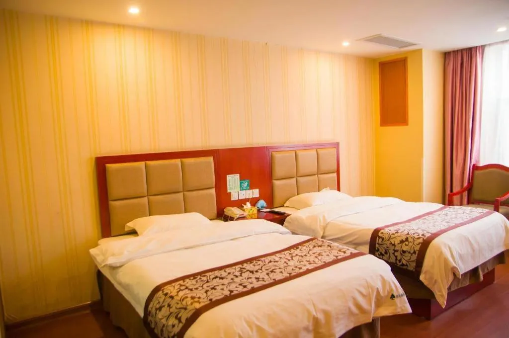 Bed in GreenTree Inn Chuzhou City Quanjiao County High-Speed Italy Trade City Business Hotel