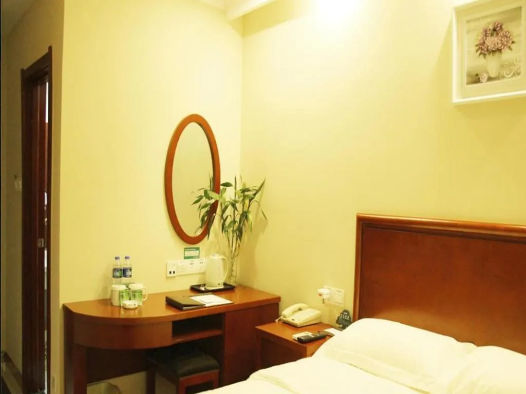 Bed in GreenTree Inn Chuzhou City Quanjiao County High-Speed Italy Trade City Business Hotel