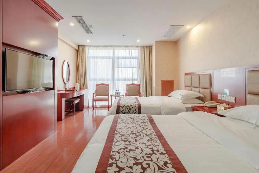 Bed in GreenTree Inn Chuzhou City Quanjiao County High-Speed Italy Trade City Business Hotel