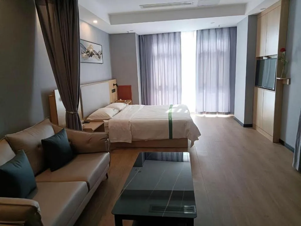 Bed in GreenTree Inn Chuzhou City Quanjiao County High-Speed Italy Trade City Business Hotel