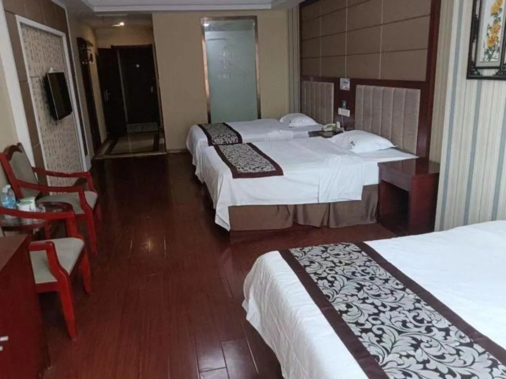 Bed in GreenTree Inn Chuzhou City Quanjiao County High-Speed Italy Trade City Business Hotel