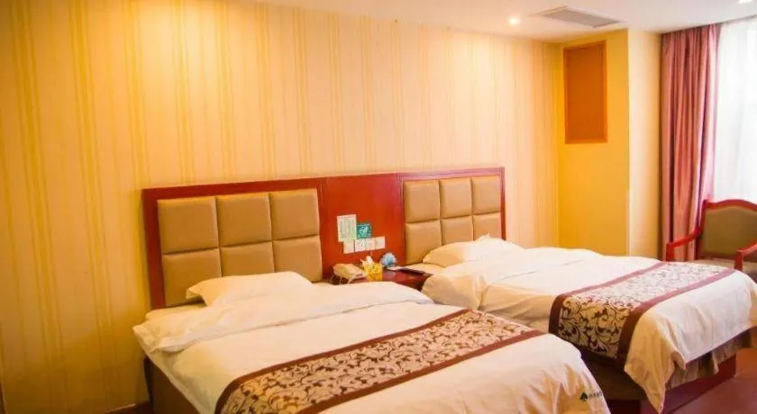 Bed in GreenTree Inn Chuzhou City Quanjiao County High-Speed Italy Trade City Business Hotel