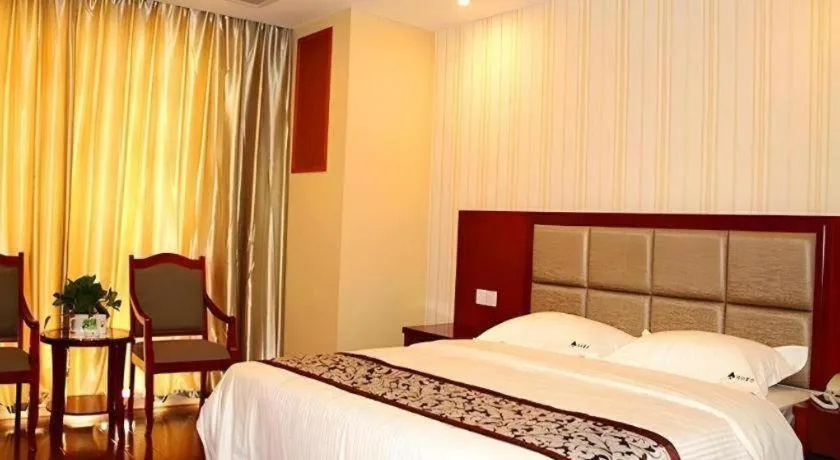 Bed in GreenTree Inn Chuzhou City Quanjiao County High-Speed Italy Trade City Business Hotel