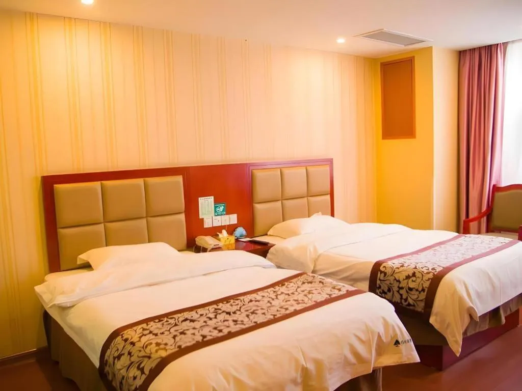 Bed in GreenTree Inn Chuzhou City Quanjiao County High-Speed Italy Trade City Business Hotel