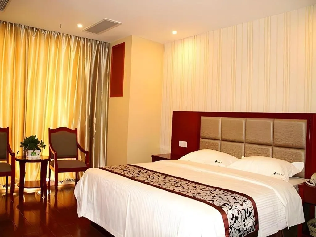 Bed in GreenTree Inn Chuzhou City Quanjiao County High-Speed Italy Trade City Business Hotel