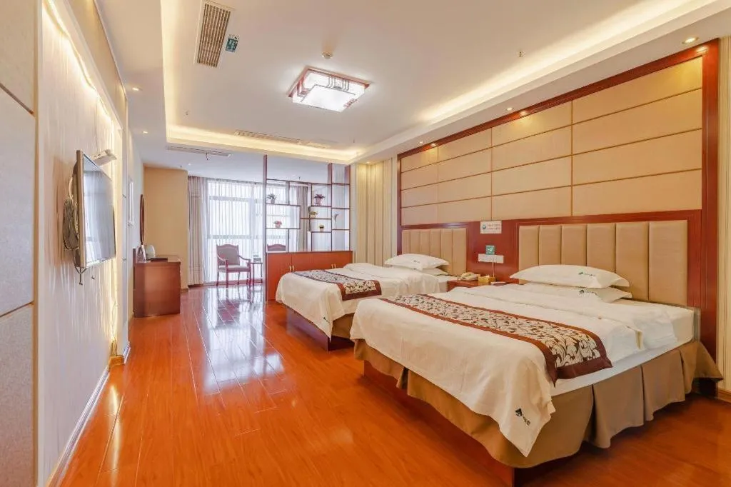 Bed in GreenTree Inn Chuzhou City Quanjiao County High-Speed Italy Trade City Business Hotel