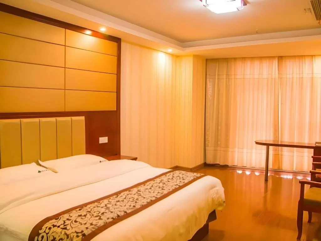 Bed in GreenTree Inn Chuzhou City Quanjiao County High-Speed Italy Trade City Business Hotel