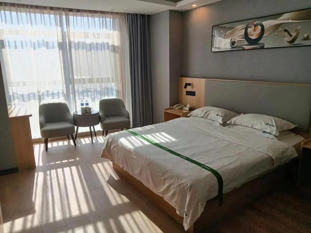 Bed in GreenTree Inn Chuzhou City Quanjiao County High-Speed Italy Trade City Business Hotel