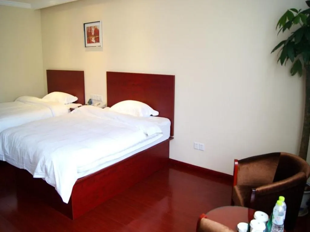 Bed in GreenTree Inn Chuzhou City Quanjiao County High-Speed Italy Trade City Business Hotel