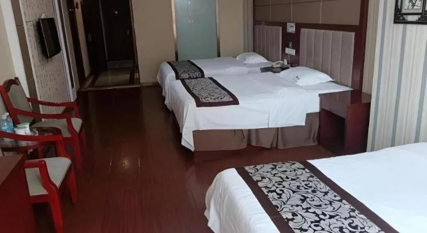 Bed in GreenTree Inn Chuzhou City Quanjiao County High-Speed Italy Trade City Business Hotel