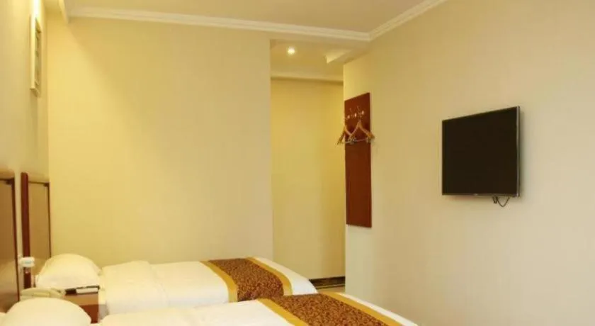 Bed in GreenTree Inn Chuzhou City Quanjiao County High-Speed Italy Trade City Business Hotel