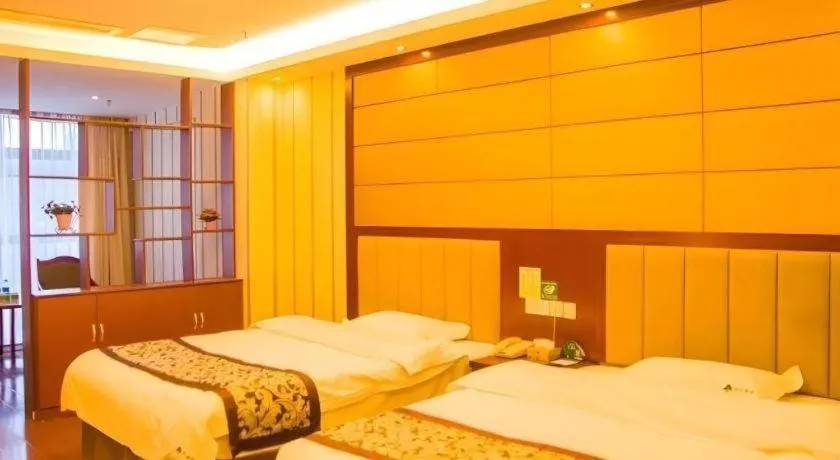 Bed in GreenTree Inn Chuzhou City Quanjiao County High-Speed Italy Trade City Business Hotel