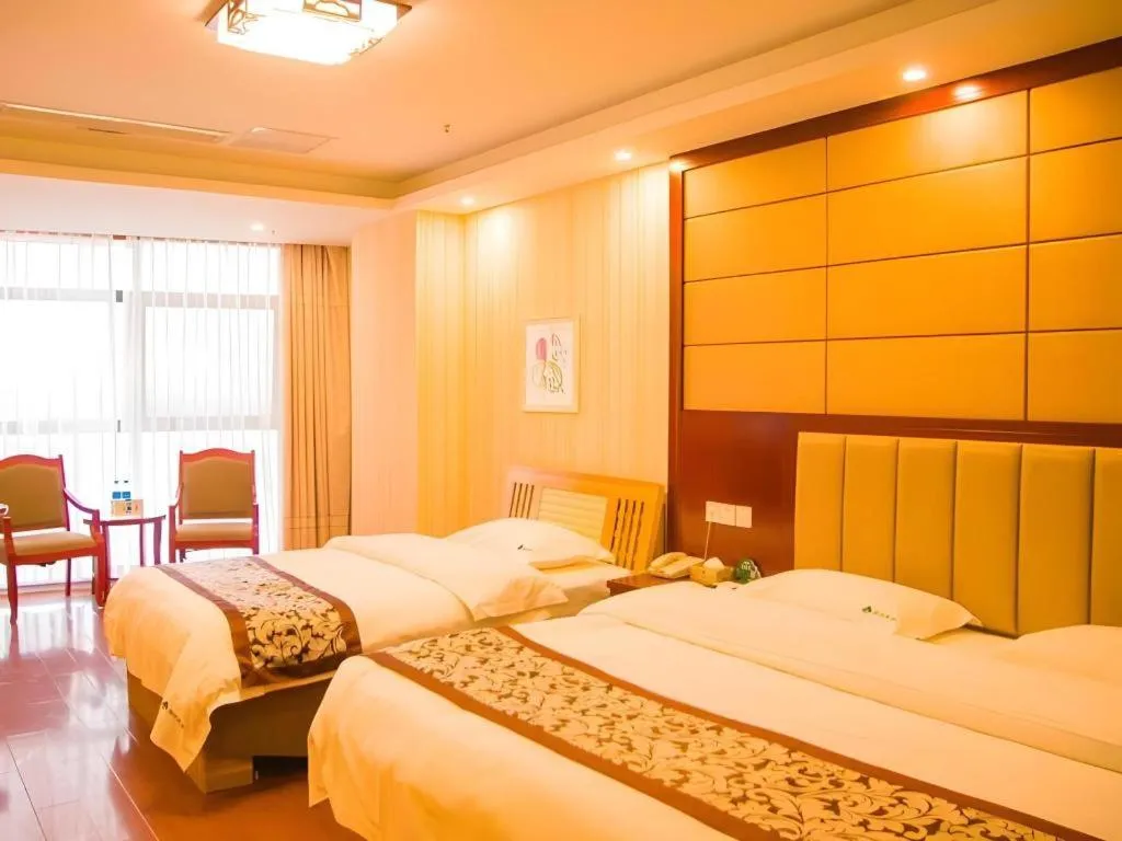 Bed in GreenTree Inn Chuzhou City Quanjiao County High-Speed Italy Trade City Business Hotel