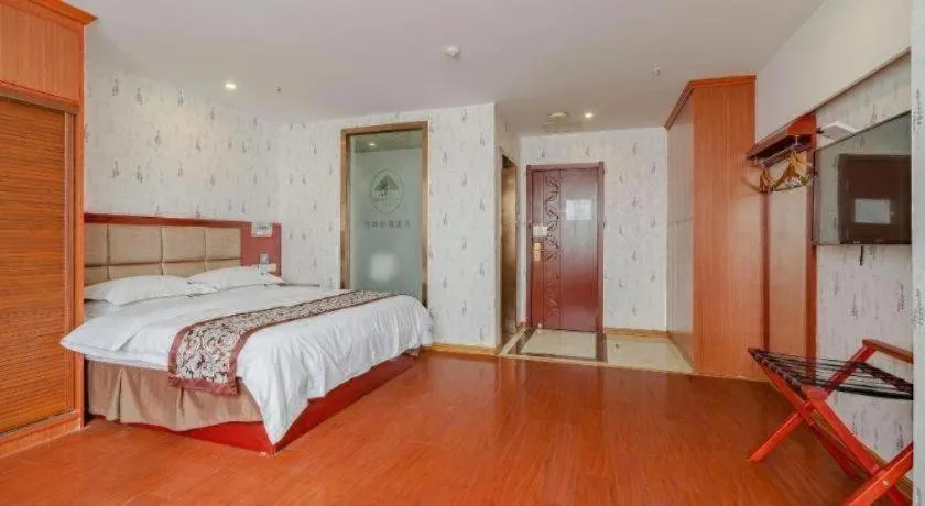 Bed in GreenTree Inn Chuzhou City Quanjiao County High-Speed Italy Trade City Business Hotel