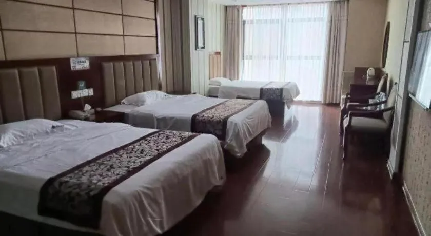 Bed in GreenTree Inn Chuzhou City Quanjiao County High-Speed Italy Trade City Business Hotel
