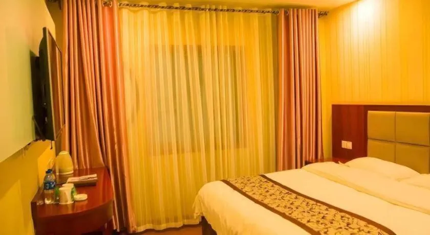 Bed in GreenTree Inn Chuzhou City Quanjiao County High-Speed Italy Trade City Business Hotel