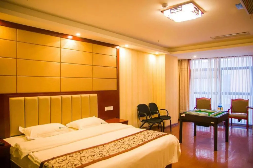 Bed in GreenTree Inn Chuzhou City Quanjiao County High-Speed Italy Trade City Business Hotel