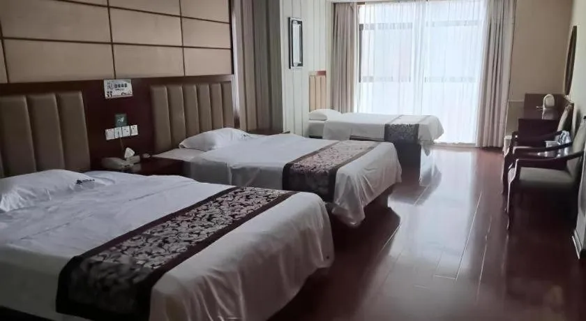 Bed in GreenTree Inn Chuzhou City Quanjiao County High-Speed Italy Trade City Business Hotel