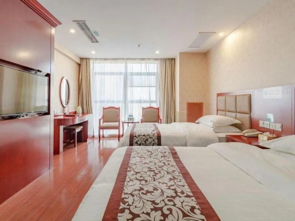 Bed in GreenTree Inn Chuzhou City Quanjiao County High-Speed Italy Trade City Business Hotel