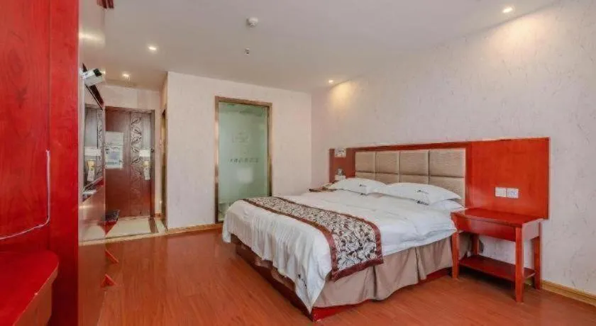 Bed in GreenTree Inn Chuzhou City Quanjiao County High-Speed Italy Trade City Business Hotel