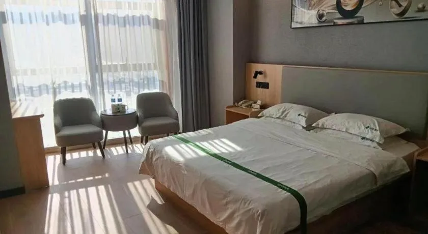Bed in GreenTree Inn Chuzhou City Quanjiao County High-Speed Italy Trade City Business Hotel
