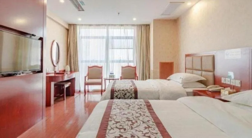 Bed in GreenTree Inn Chuzhou City Quanjiao County High-Speed Italy Trade City Business Hotel