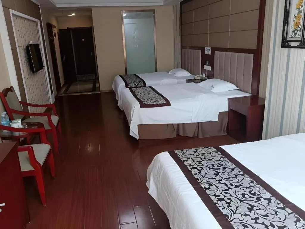 Bed in GreenTree Inn Chuzhou City Quanjiao County High-Speed Italy Trade City Business Hotel