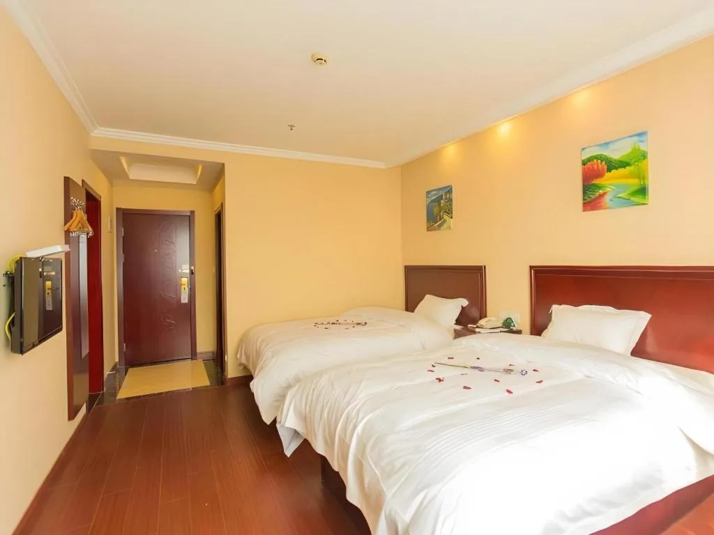 Bed in GreenTree Inn Taizhou New District Hospital of Renmin Hospital Mingliu Express Hotel