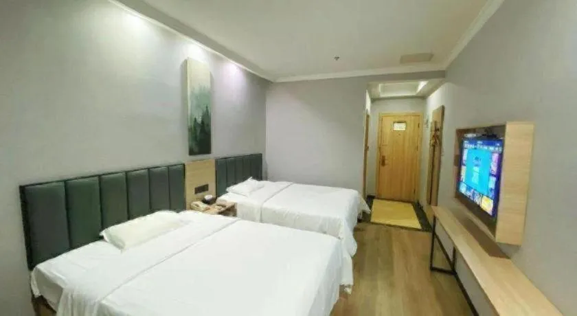 Bed in GreenTree Inn Taizhou New District Hospital of Renmin Hospital Mingliu Express Hotel