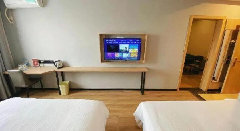 Bed in GreenTree Inn Taizhou New District Hospital of Renmin Hospital Mingliu Express Hotel