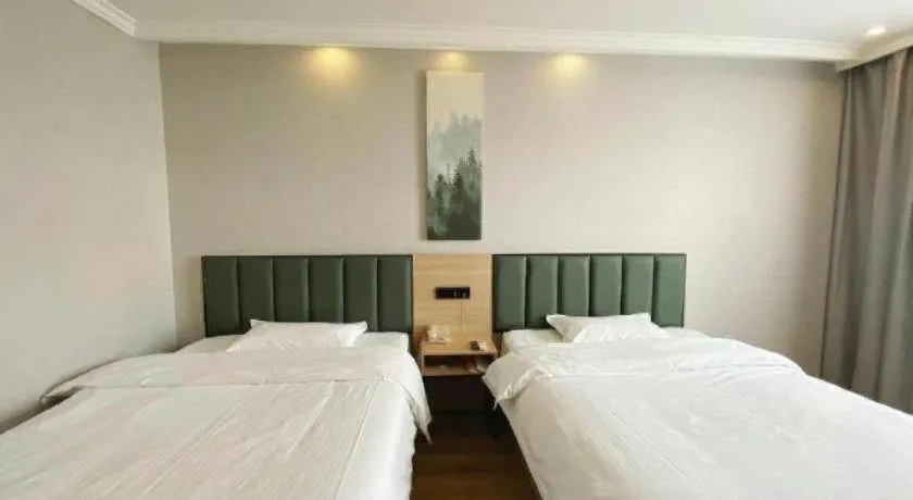 Bed in GreenTree Inn Taizhou New District Hospital of Renmin Hospital Mingliu Express Hotel