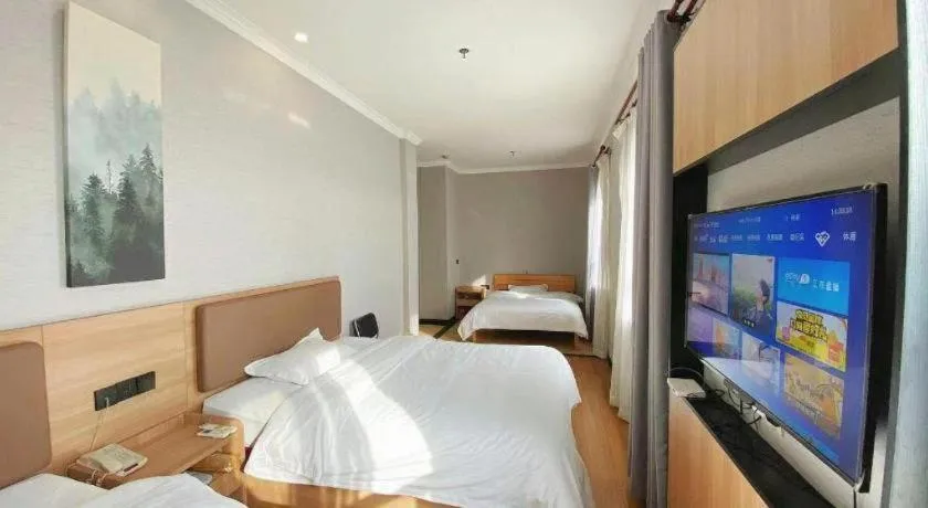 Bed in GreenTree Inn Taizhou New District Hospital of Renmin Hospital Mingliu Express Hotel