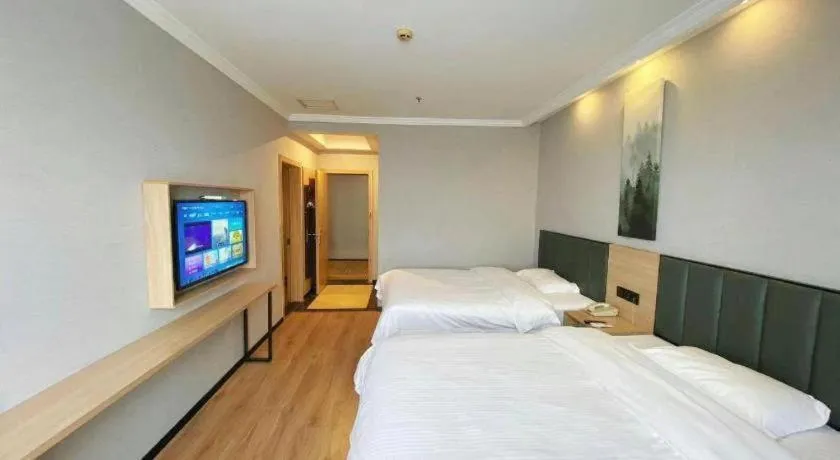 Bed in GreenTree Inn Taizhou New District Hospital of Renmin Hospital Mingliu Express Hotel