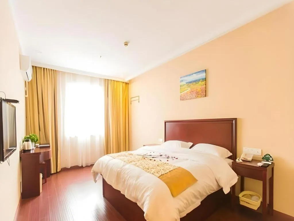 Bed in GreenTree Inn Taizhou New District Hospital of Renmin Hospital Mingliu Express Hotel